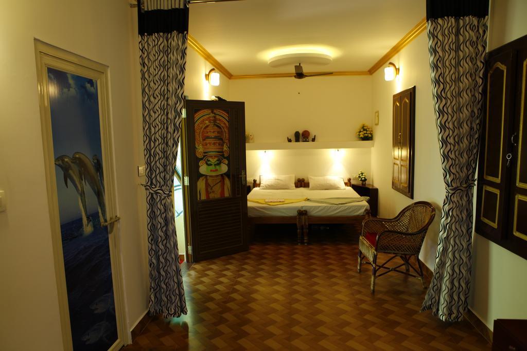 Marari Neena Beach Homestay Mararikulam Rum bild